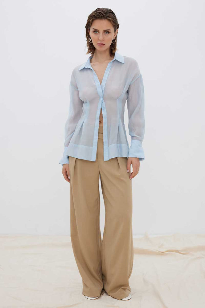 
                      
                        ENIGMA SEMI SHEER SHIRT - DAWN BLUE
                      
                    