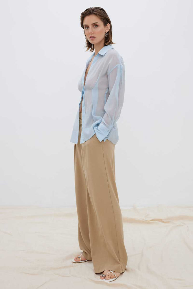 
                      
                        ENIGMA SEMI SHEER SHIRT - DAWN BLUE
                      
                    