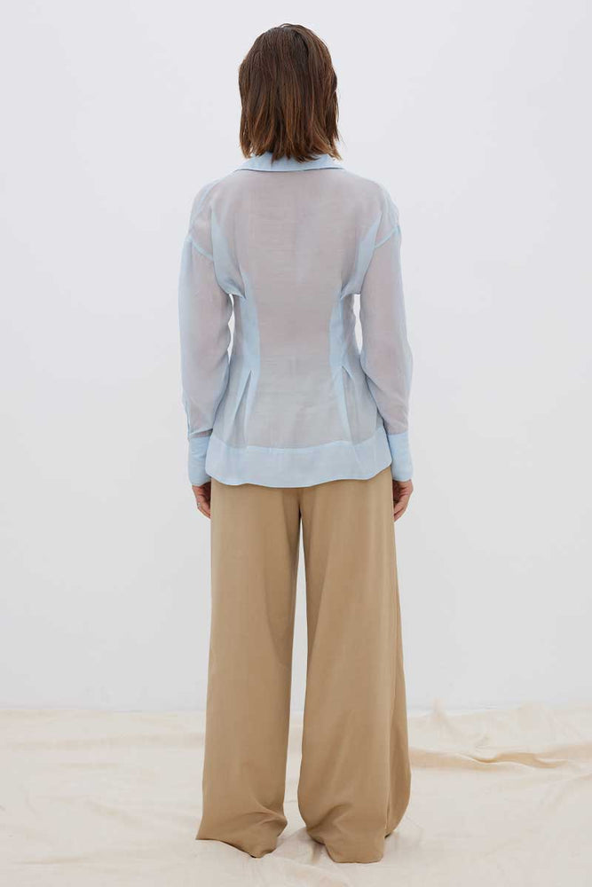 
                      
                        ENIGMA SEMI SHEER SHIRT - DAWN BLUE
                      
                    