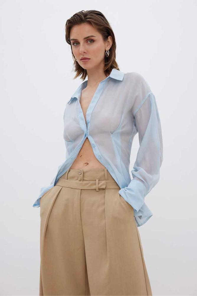 
                      
                        ENIGMA SEMI SHEER SHIRT - DAWN BLUE
                      
                    